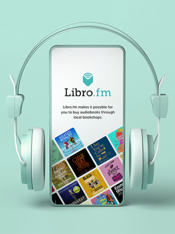 phone with Libro.fm image on screen and headphones surrounding